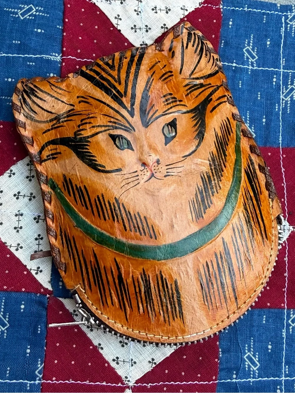Vintage Brown Leather Cat Pouch with Green Collar Design